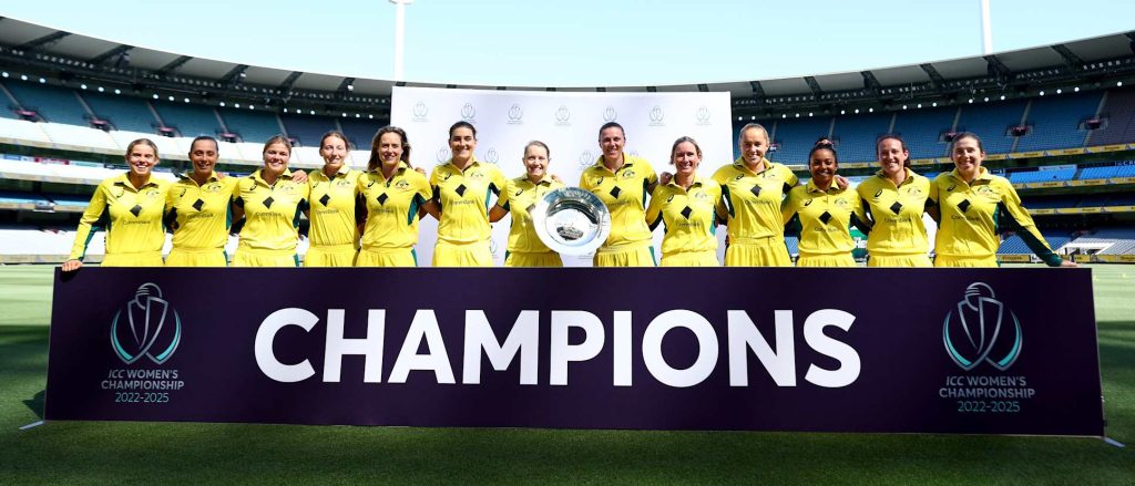 Australian women’s cricket team celebrates their ICC Women’s Championship 2025 victory, with captain Alyssa Healy proudly holding the trophy in Melbourne