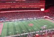 A panoramic view of Memorial Stadium during a Nebraska football game, showcasing the electrifying atmosphere of the 2025 season.