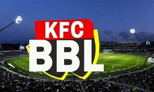 "KFC BBL logo overlaid on a packed cricket stadium illuminated at night."