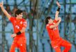 "Naseem Shah celebrates a wicket with a teammate during a Pakistan Super League match for Islamabad United."